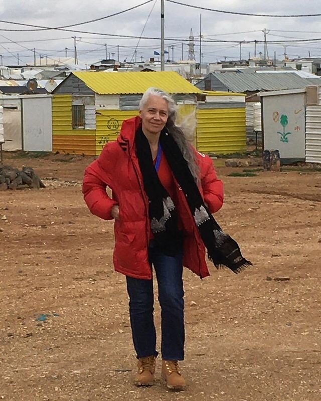 My first day back in Za&rsquo;atari this year.  The best way to feel how things are is to walk it.
 Meeting children&rsquo;s faces,  as they peer through the doors of their homes, shouting the English they know as a greeting - walking to the homes of our friends through much mud ( rain on a desert floor goes nowhere, the camp a patchwork of small lakes &amp; dryer islands) hearing the gossip, &amp; the challenge of the Winter &amp; but mostly to me ,of their resilience within themselves &amp; their wild innovation with materials &amp; solutions to hardship. It&rsquo;s the miraculous made almost ordinary,where rich human connection is everything.